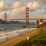 Golden Gate Bridge rises majestically over calm waters at sunset.