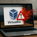 Oracle VirtualBox on macOS ARM: Two CVEs Enable VM Escape, Patched in October 2025 CPU Laptop screen displaying VirtualBox logo with a warning symbol overlay.