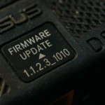 Text label on a device showing firmware update details and version number.