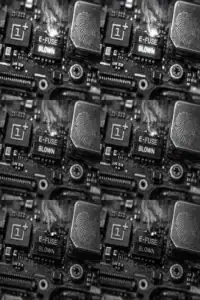 Close-up of a circuit board showing a blown e-fuse and smoke.